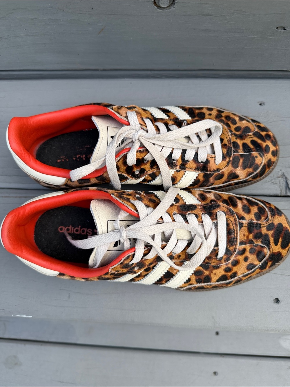 adidas women’s Leopard Print Sneakers with White Stripes and orange trim. - Picture 3 of 10